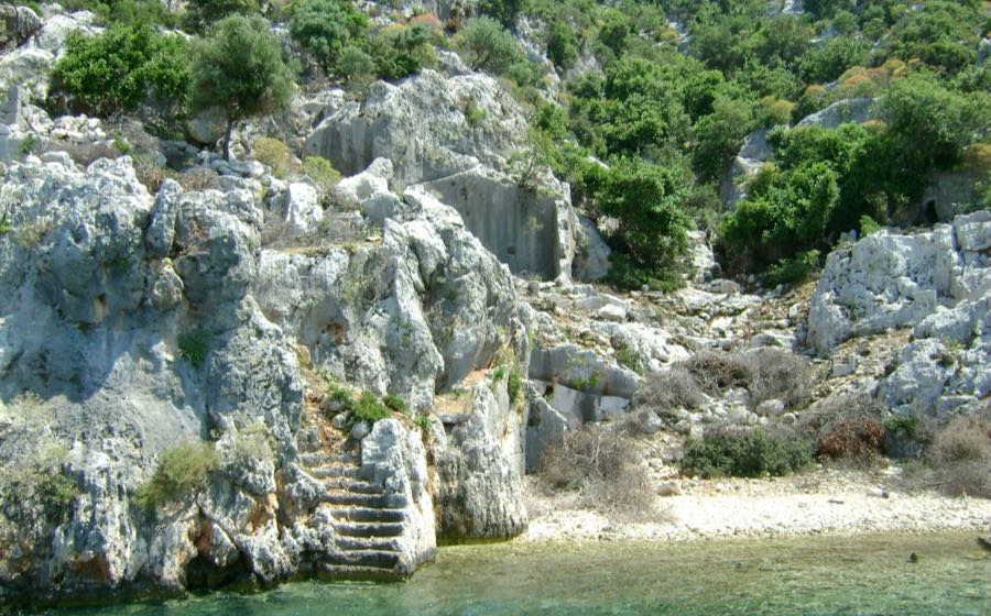 Sunken walls of the Lycian city on the shore of Kekova, the end of the Kaş section of the Lycian Way